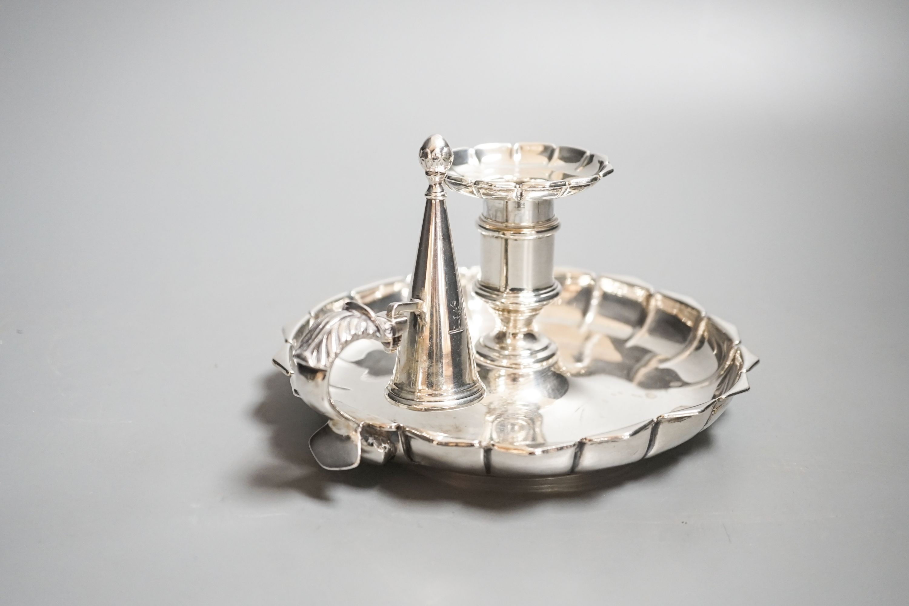 A William IV silver chamberstick, by Robinson, Edkins & Aston, Birmingham, 1835, 16.2cm, in diameter, 11oz.